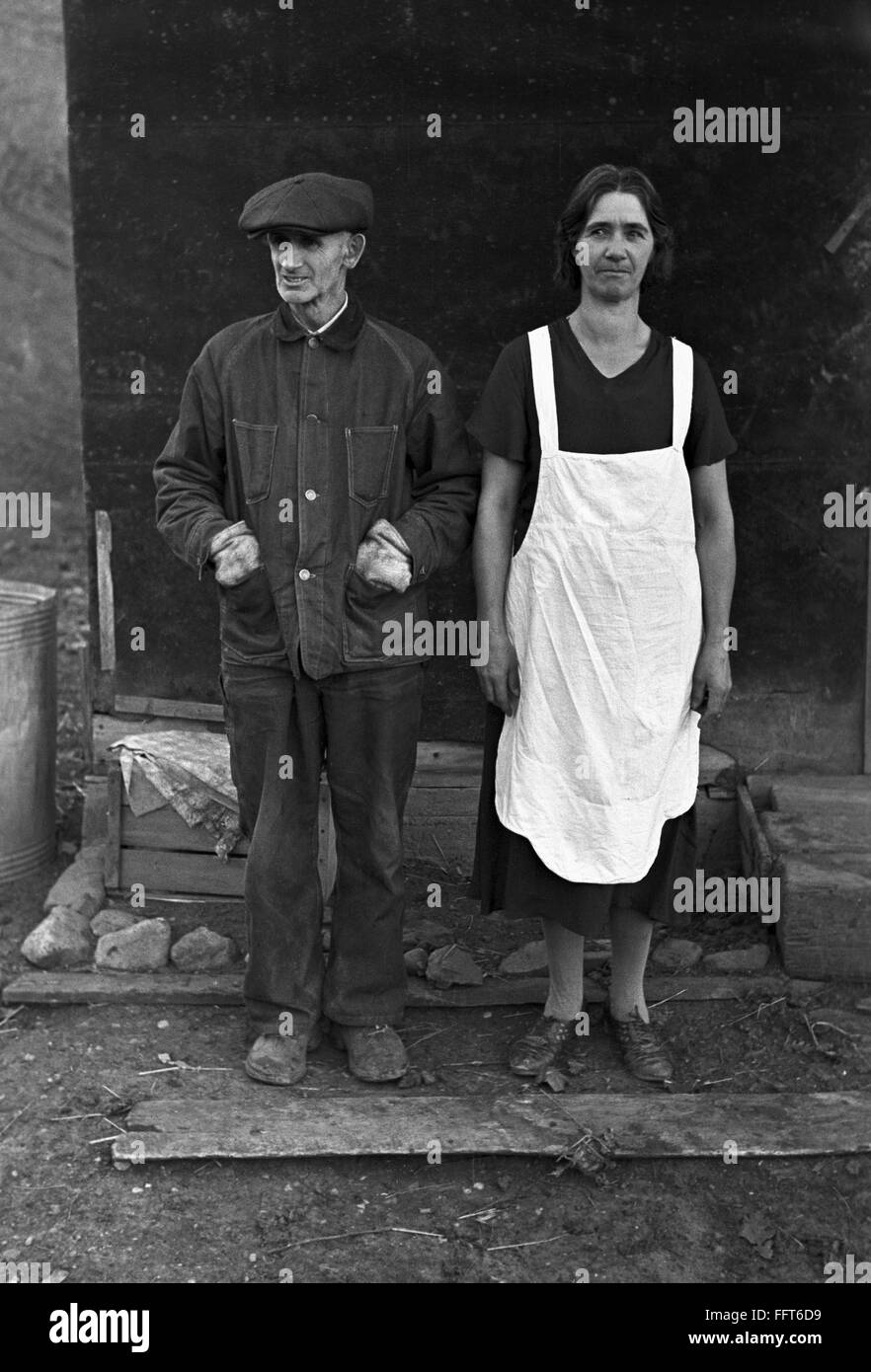 IOWA FARM COUPLE, 1936. /nA farmer and his wife struggling to keep