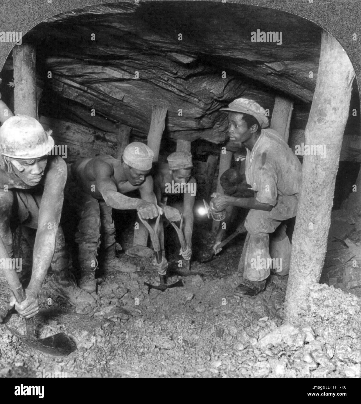 SOUTH AFRICA GOLD MINERS. /nFive gold miners following the compressed