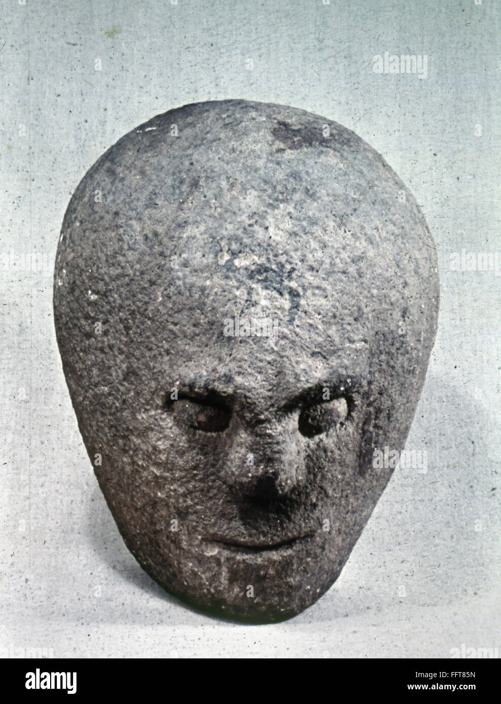 THREEFACED STONE HEAD. /nAncient threefaced stone head from the early