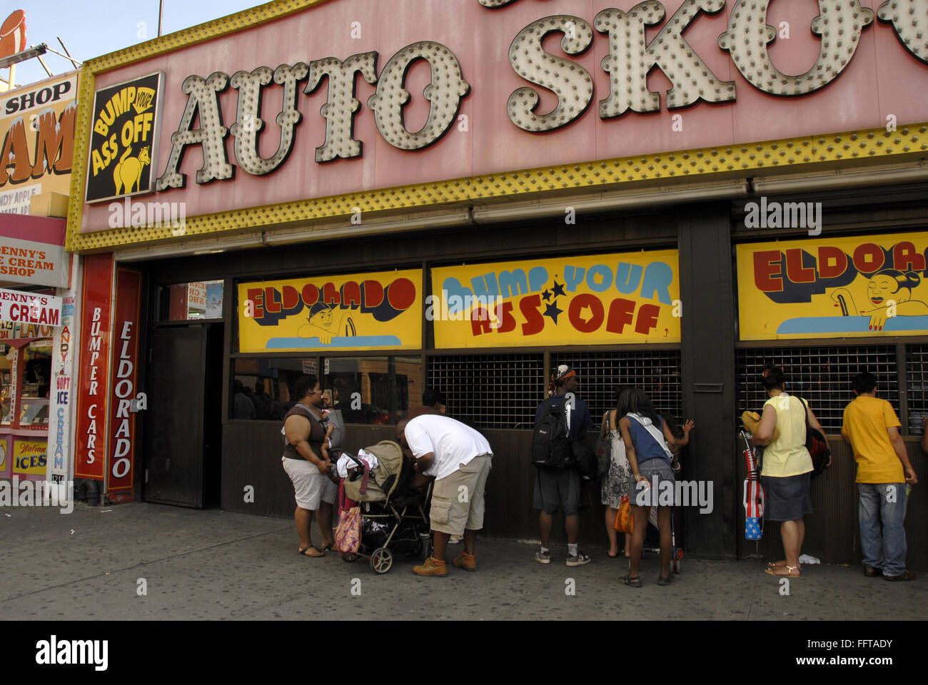 CONEY ISLAND BUMPER CARS. /nPeople standing outside the El Dorado bumber cars on Surf Avenue