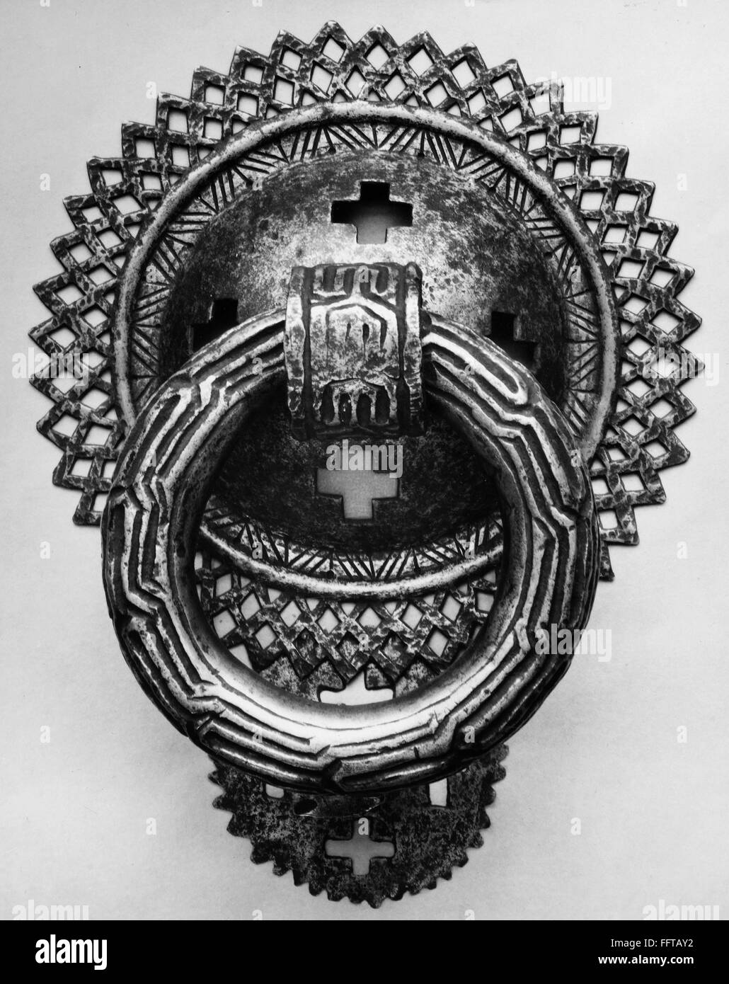 SPAIN: IRON KNOCKER. /nIron door knocker stamped with crosses, from Spain, 15th or 16th century. Stock Photo