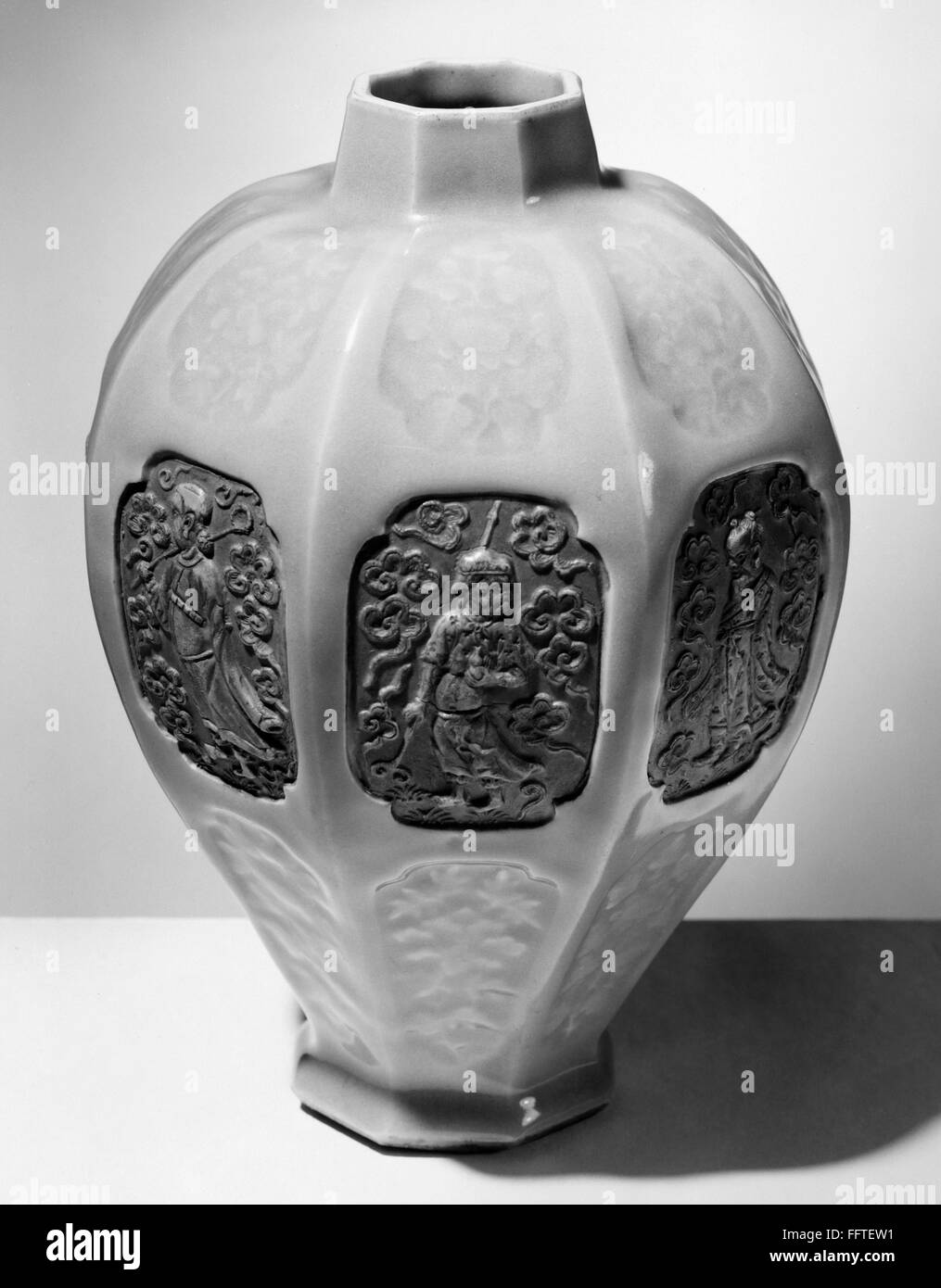 CHINA IMMORTALS VASE. /nOctagonal glazed porcelain vase, with unglazed