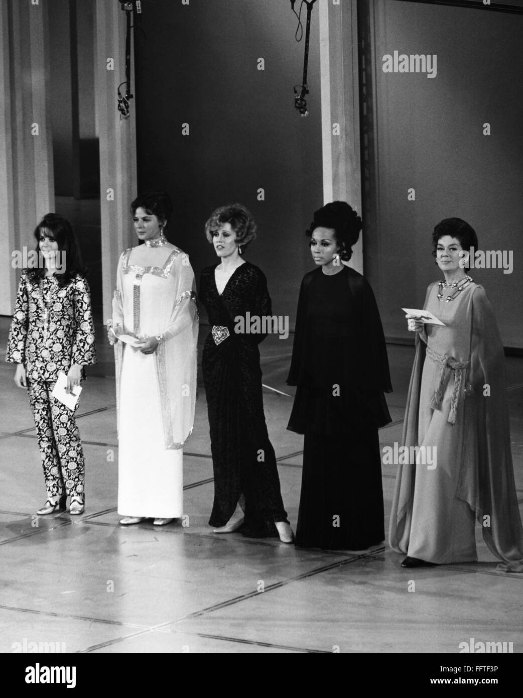 ACADEMY AWARDS, c1970./nFrom left: Natalie Wood, Ingrid Bergman, Jane Fonda, Diahann Carroll and Rosalind Russell at the Oscars, c1970. Stock Photo