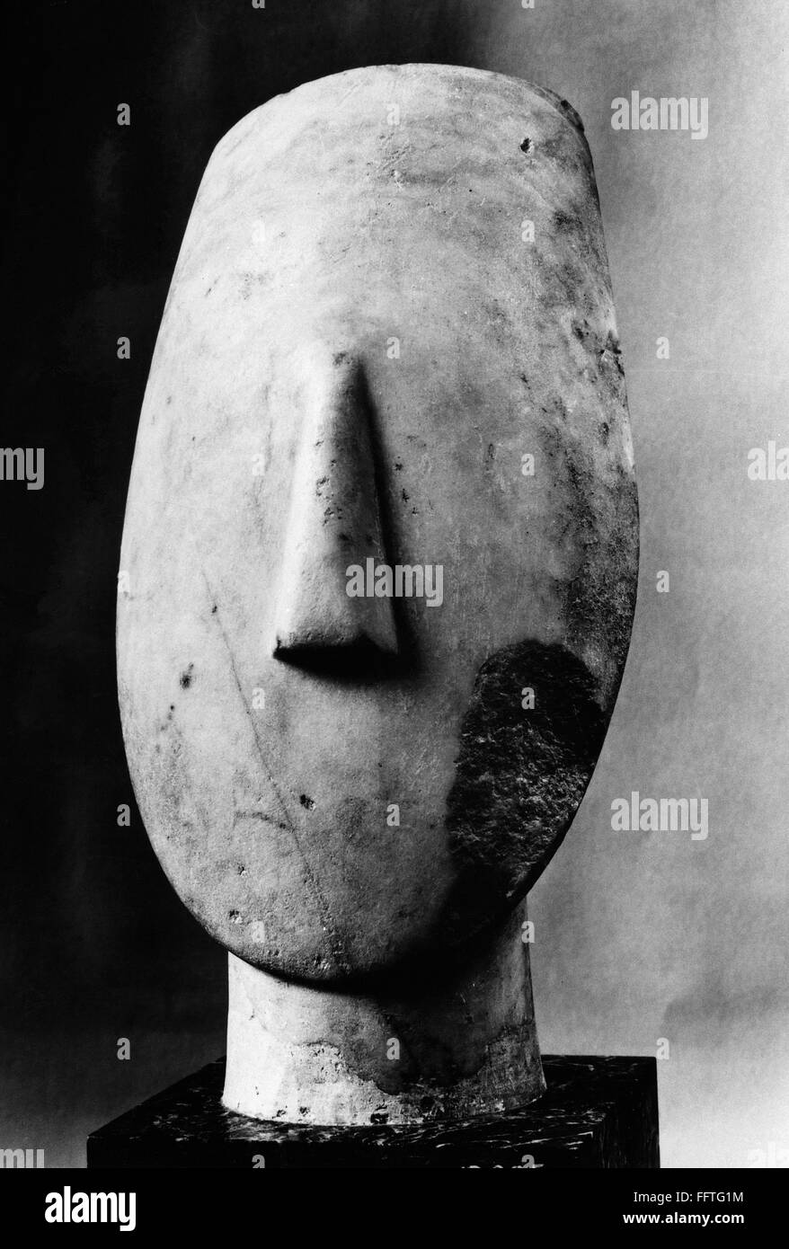 CYCLADIC SCULPTURE./nMarble head of a feminine idol from the island of