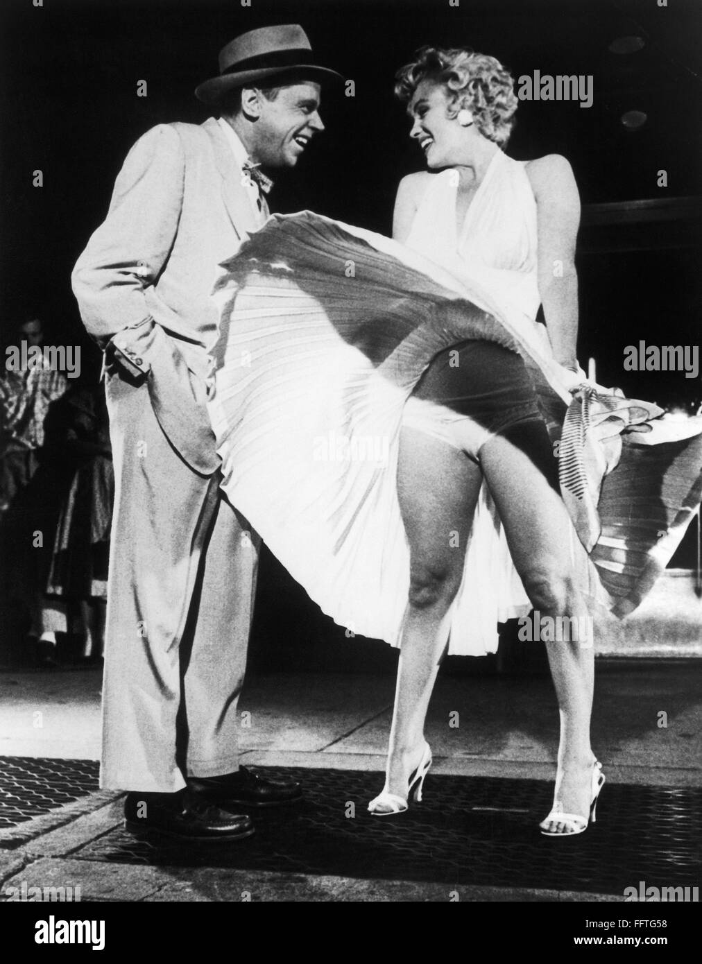 The Seven Year Itch 1955 Ntom Ewell Joining Marilyn Monroe On The Subway Grate In The Seven Year Itch Directed By Billy Wilder 1955 Stock Photo Alamy