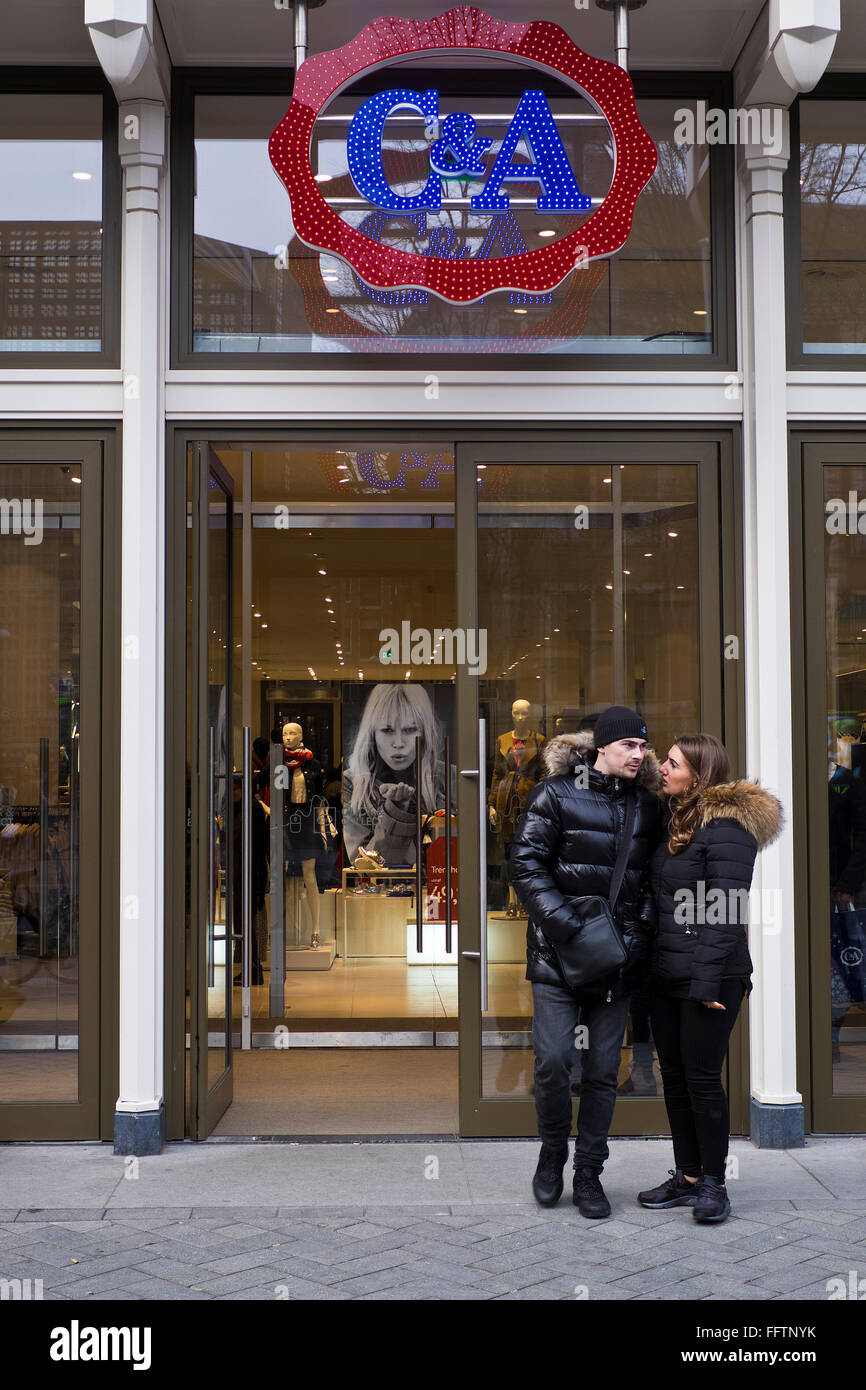 Couple stand in front of C&A store in Amsterdam in winter The Netherlands  Stock Photo - Alamy