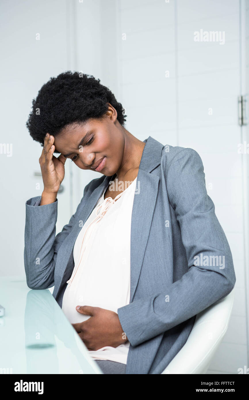 Pregnant businesswoman feeling sick Stock Photo Alamy