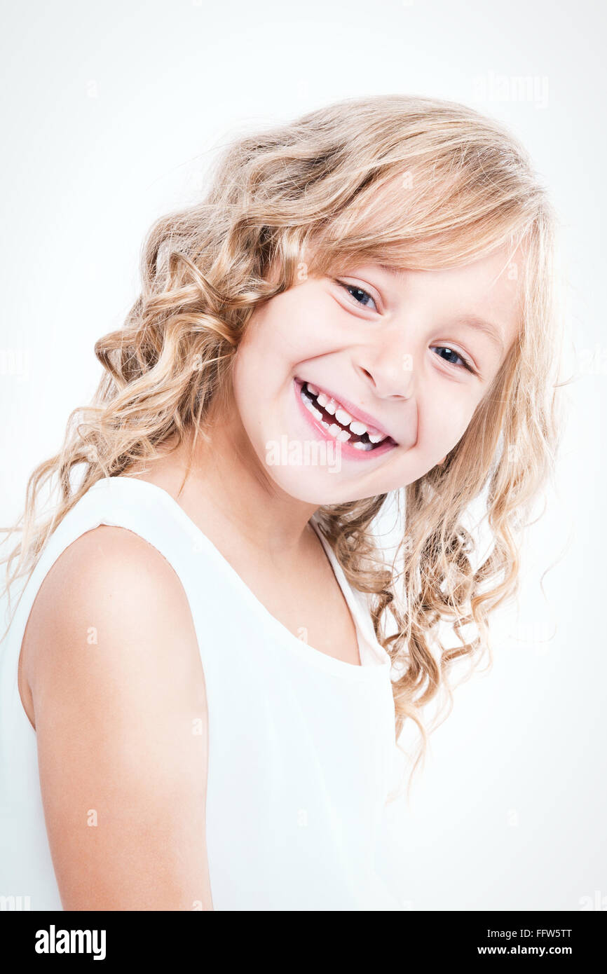 Portrait of a beautiful cheerful little girl Stock Photo