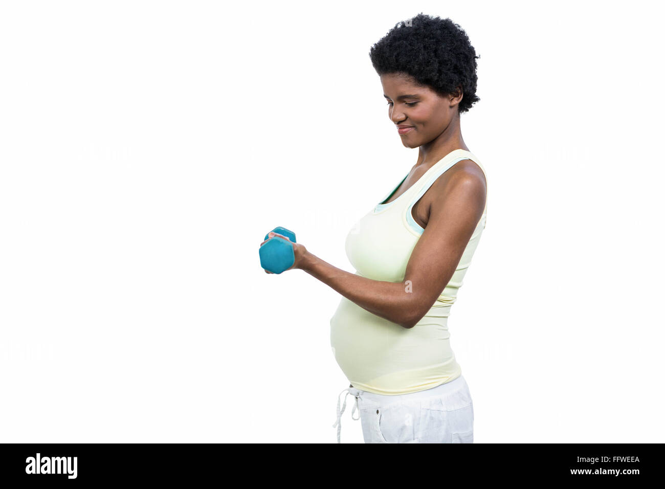 View of Pregnant woman lifting dumbbell Stock Photo - Alamy