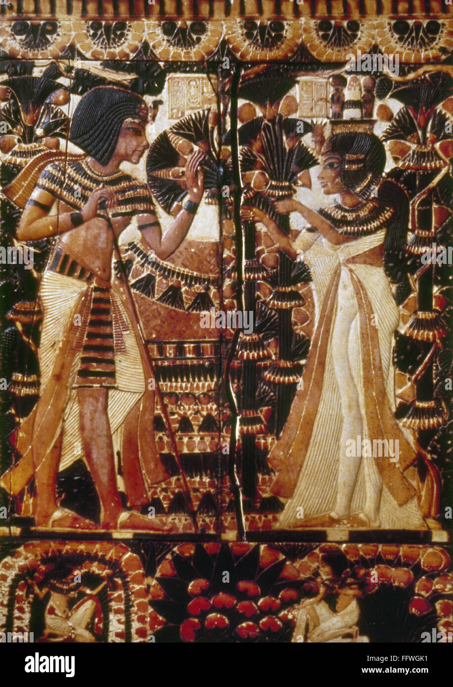 TOMB OF KING TUTANKHAMEN. /nTutankhamen and his queen, Ankhesenamun. Painted ivory panel from the lid of a wooden chest, 14th century B.C. Stock Photo