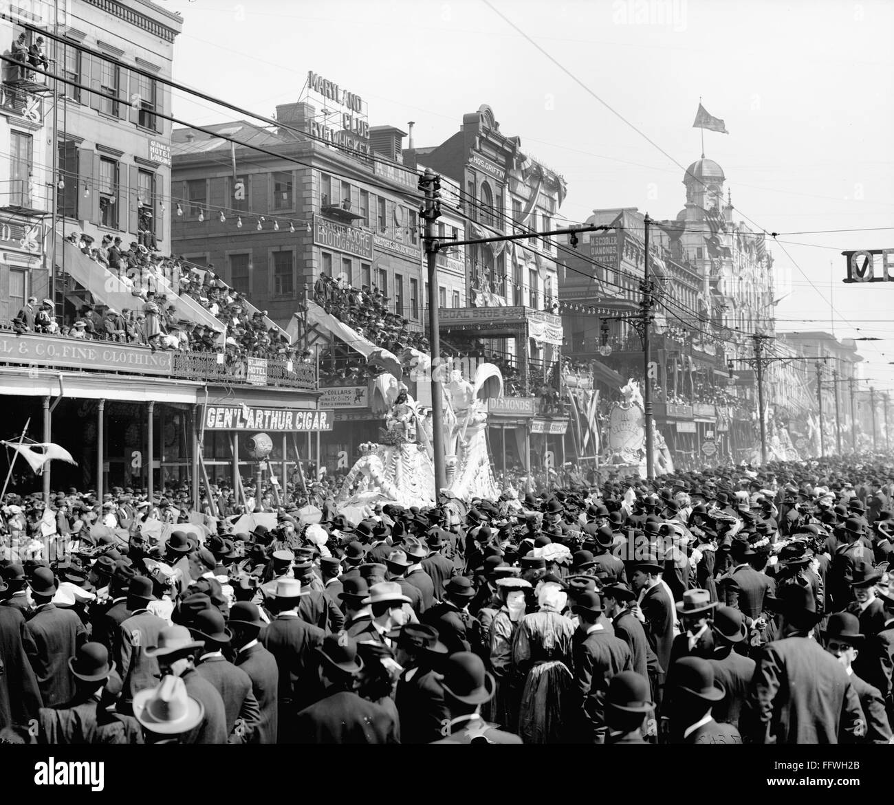 NEW ORLEANS: MARDI GRAS. /nCrowds lining the street in New Orleans, Louisiana, to watch the Rex parade during Mardi Gras festivities. Photographed c1900. Stock Photo