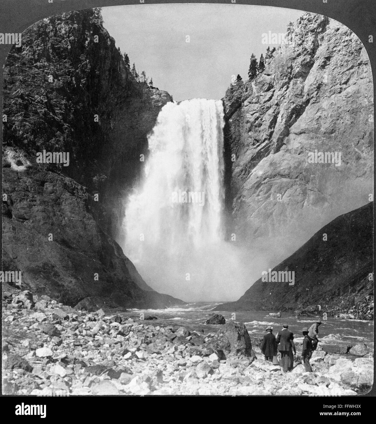 YELLOWSTONE GRAND FALLS. /nTourists walking in front of the Grand