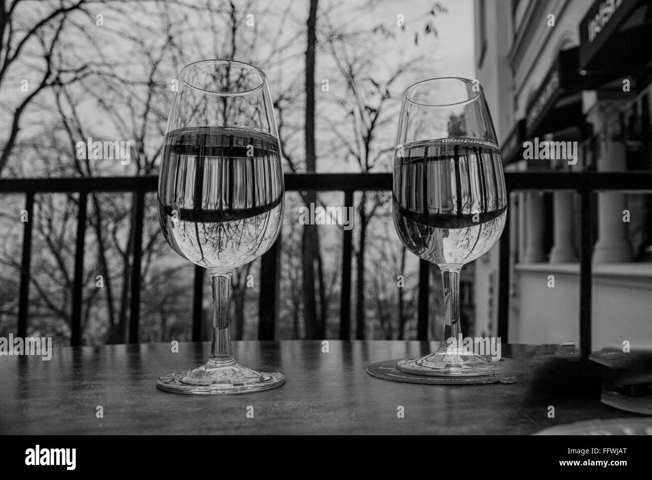 Wine glasses on balcony, Paris, France Stock Photo Alamy