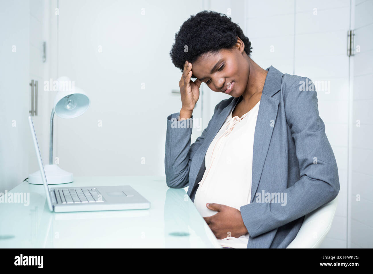 Pregnant businesswoman feeling sick Stock Photo Alamy