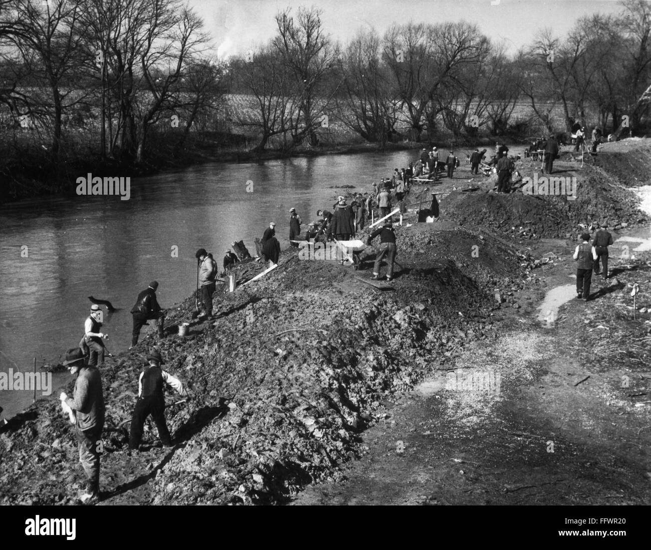 NEW DEAL: C.C.C., 1936. /nCivilian Conservation Corps workers digging ...
