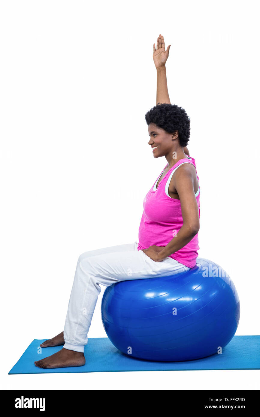 Pregnant woman on exercise ball Stock Photo Alamy