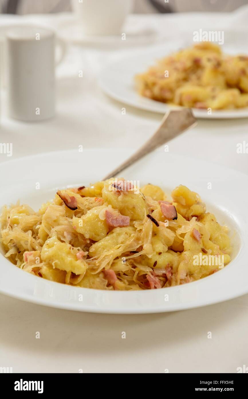 Traditional slovakian gnocchi halusky with cabbage and bacon Stock