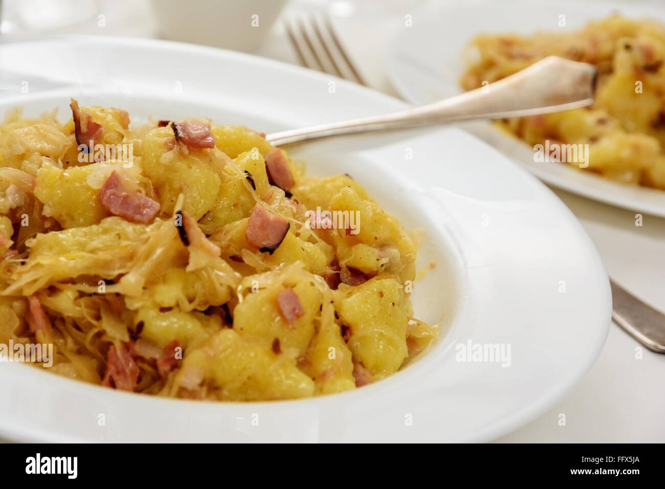 Traditional slovakian gnocchi halusky with cabbage and bacon Stock