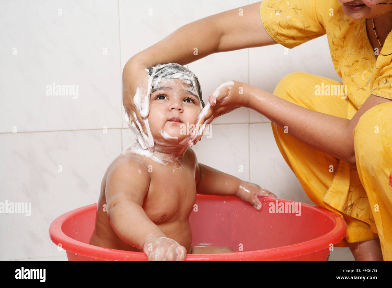 giving bath to baby