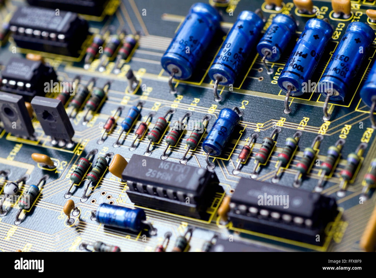 Electronic printed circuit board capacitors resistors IC Stock Photo