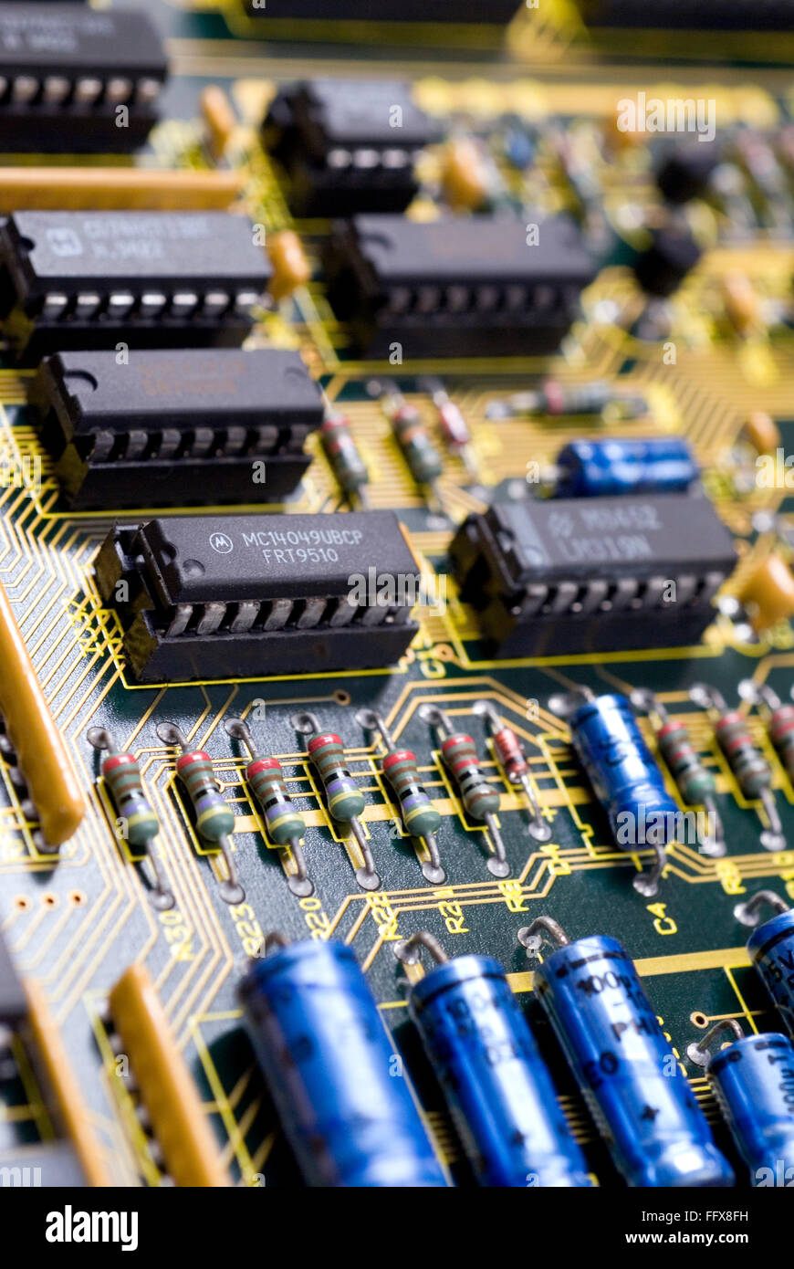 Electronic printed circuit board capacitors resistors IC Stock Photo