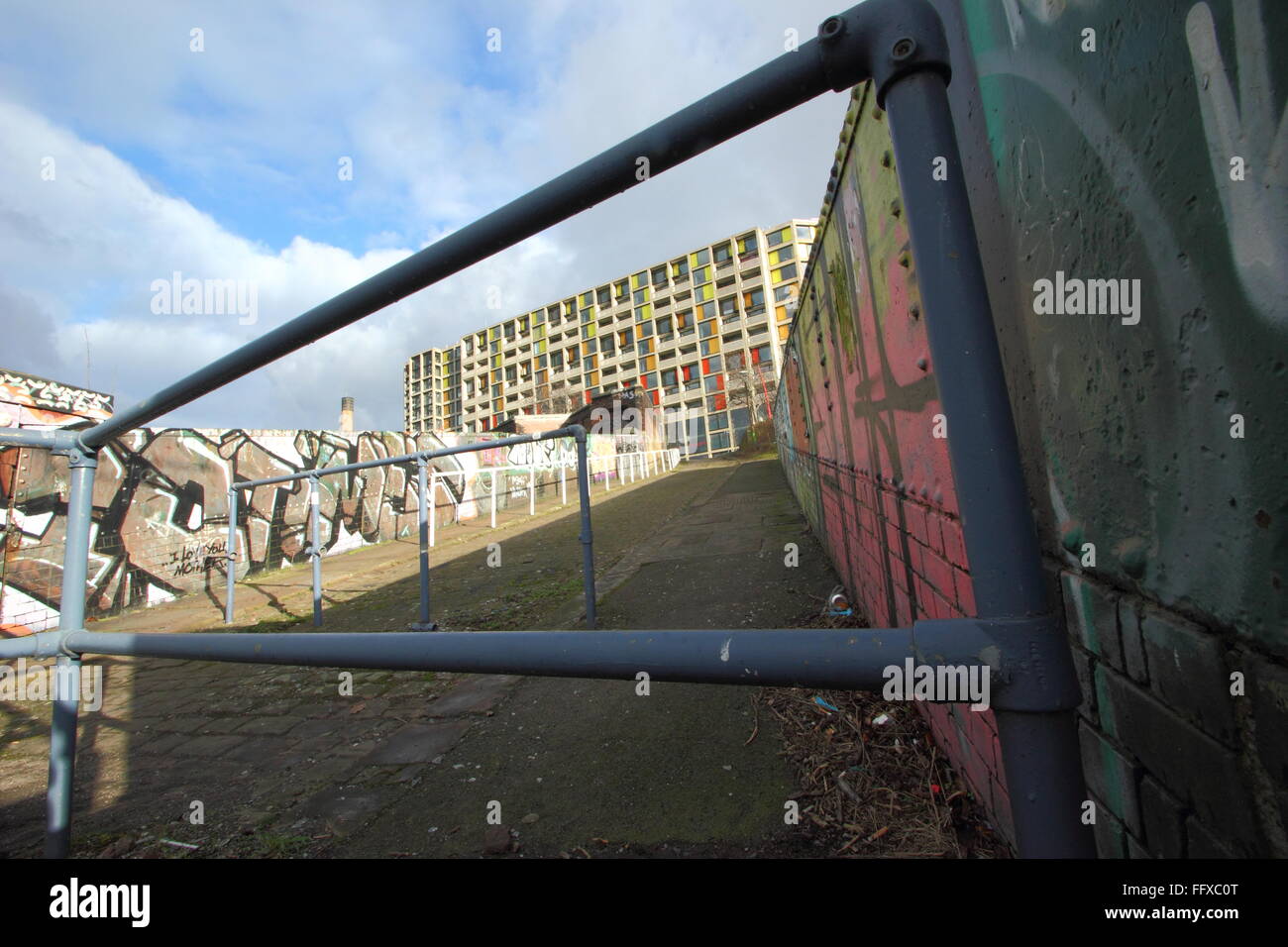Park Hill housing estate in Sheffield seen from a cobbled lane leading