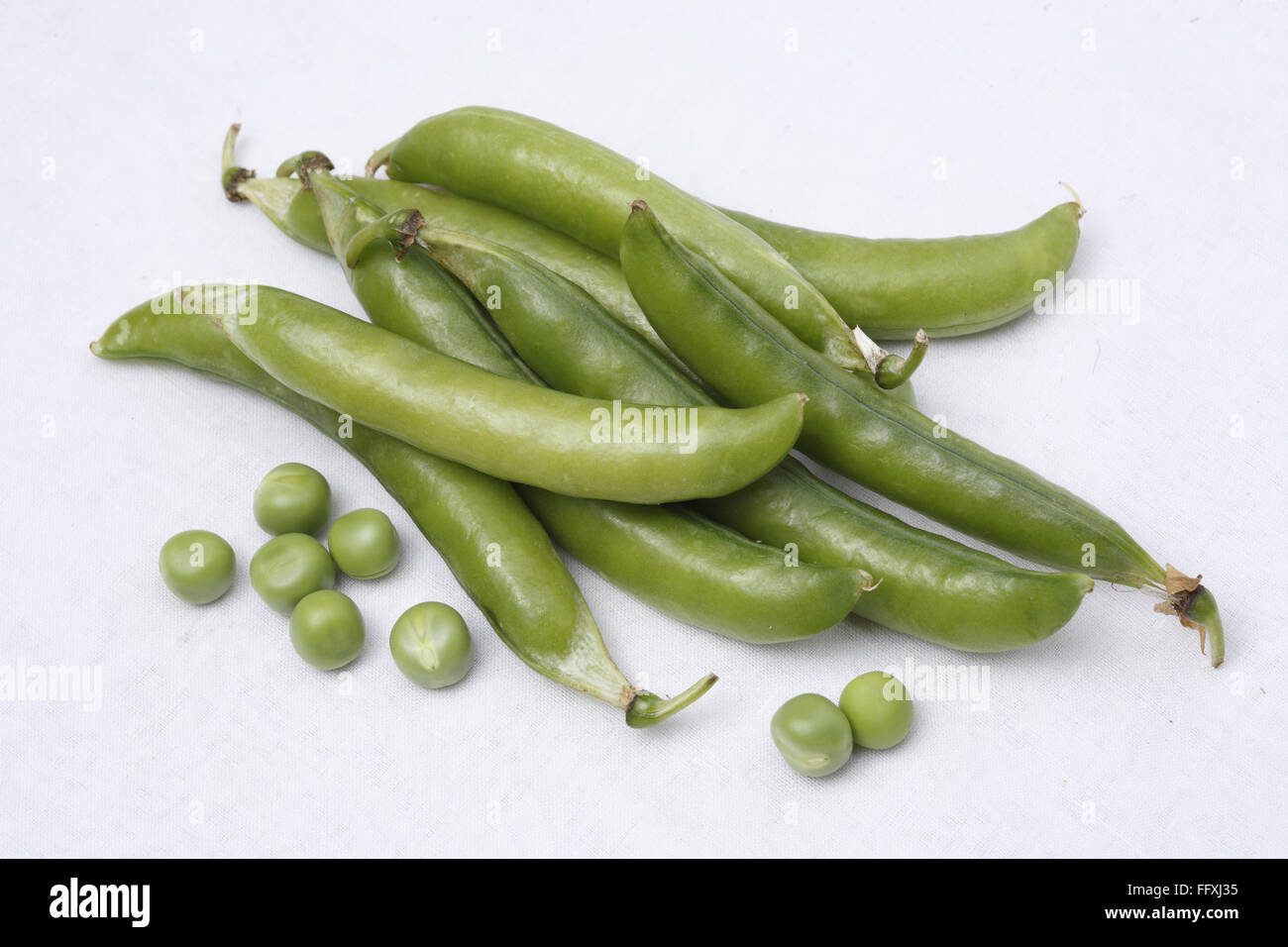 Vegetable , Green Peas pod Pisum sativum with unpeel peas on white ...