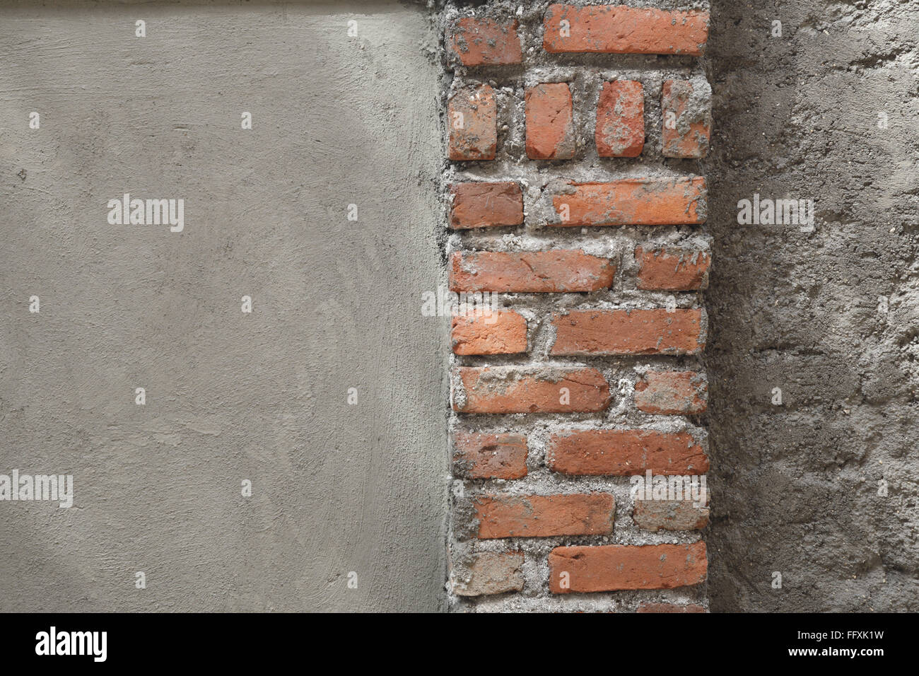 Wall with brick pillar Stock Photo