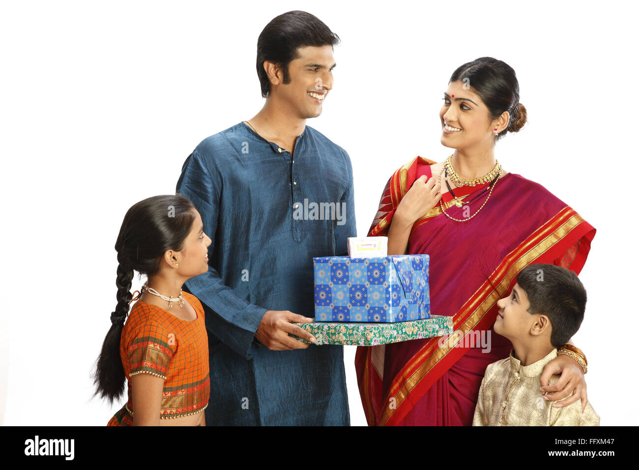 Rich rural farmer family with gift boxes MR#743A,743B,743C,743D Stock Photo