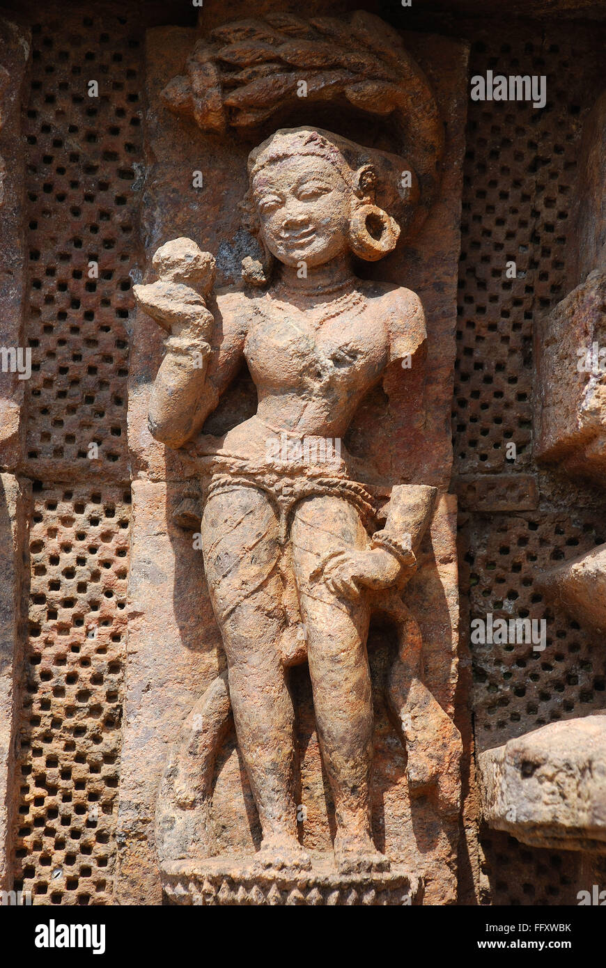 Statue of lady carved on wall of Konarak sun temple , Konarak , Orissa , India World Heritage Stock Photo