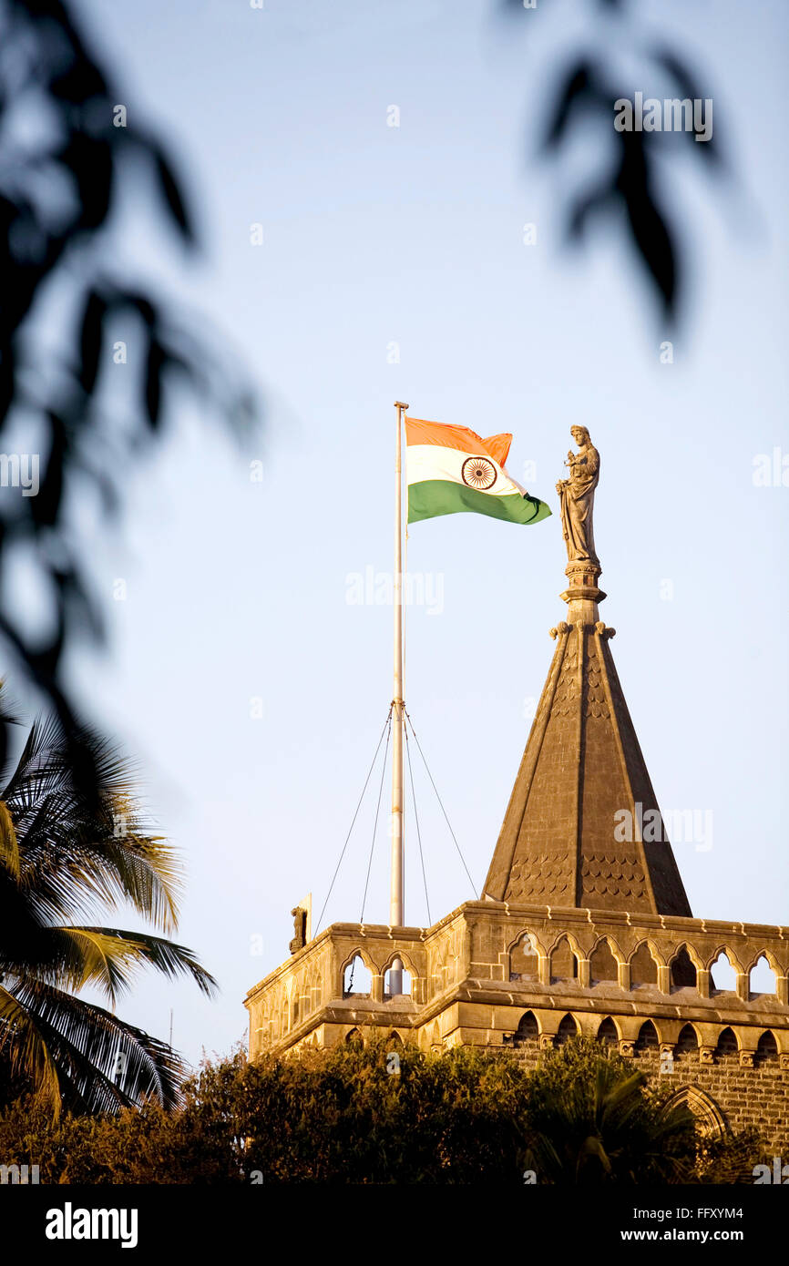 Indian flag on rooftop high court building statue nyay ki devi lady equal judgment Bombay Mumbai Maharashtra Stock Photo