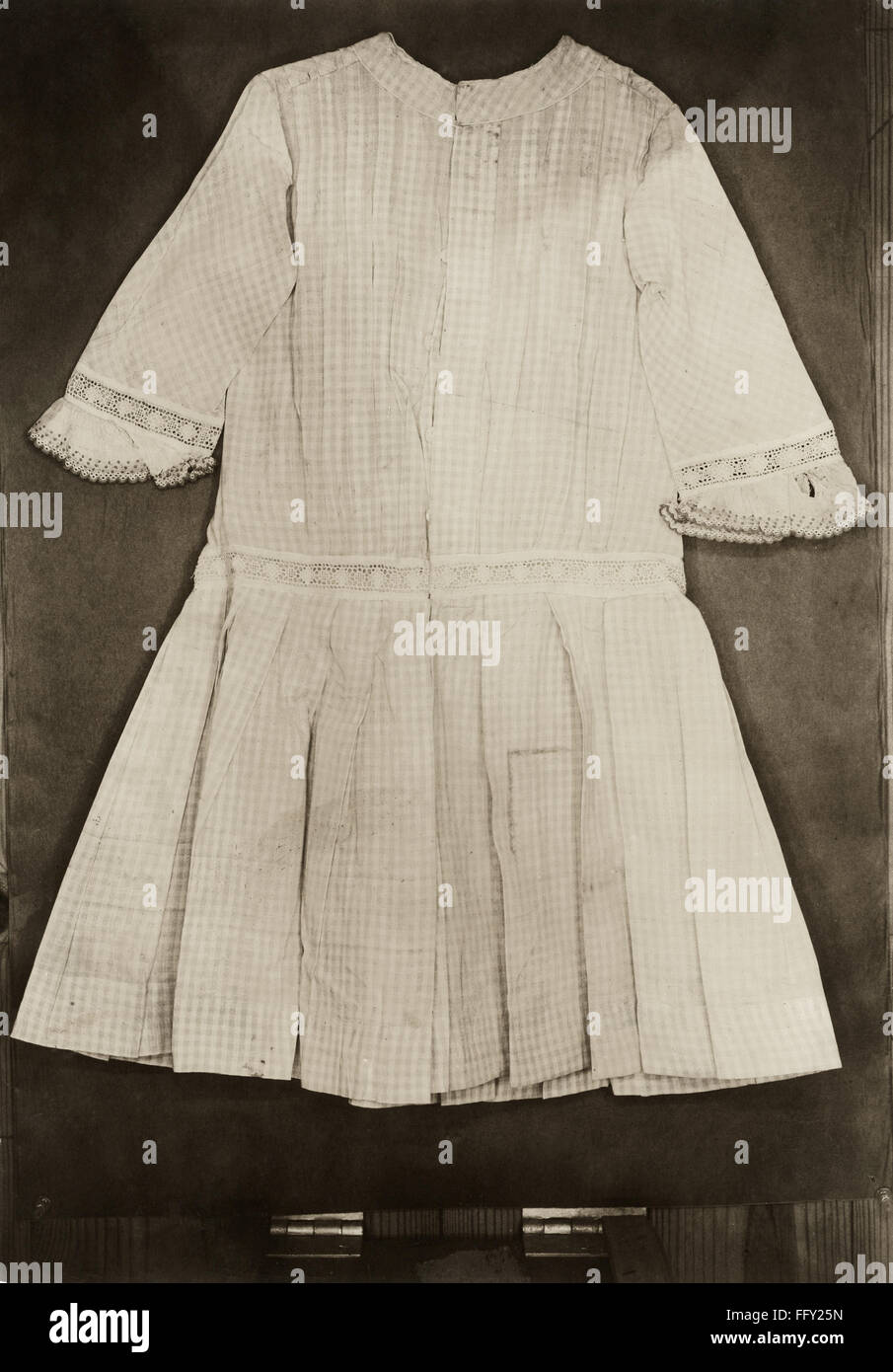 HINE: GARMENT, c1912. /nA finished dress from a factory in America. Photograph by Lewis Hine, c1912. Stock Photo