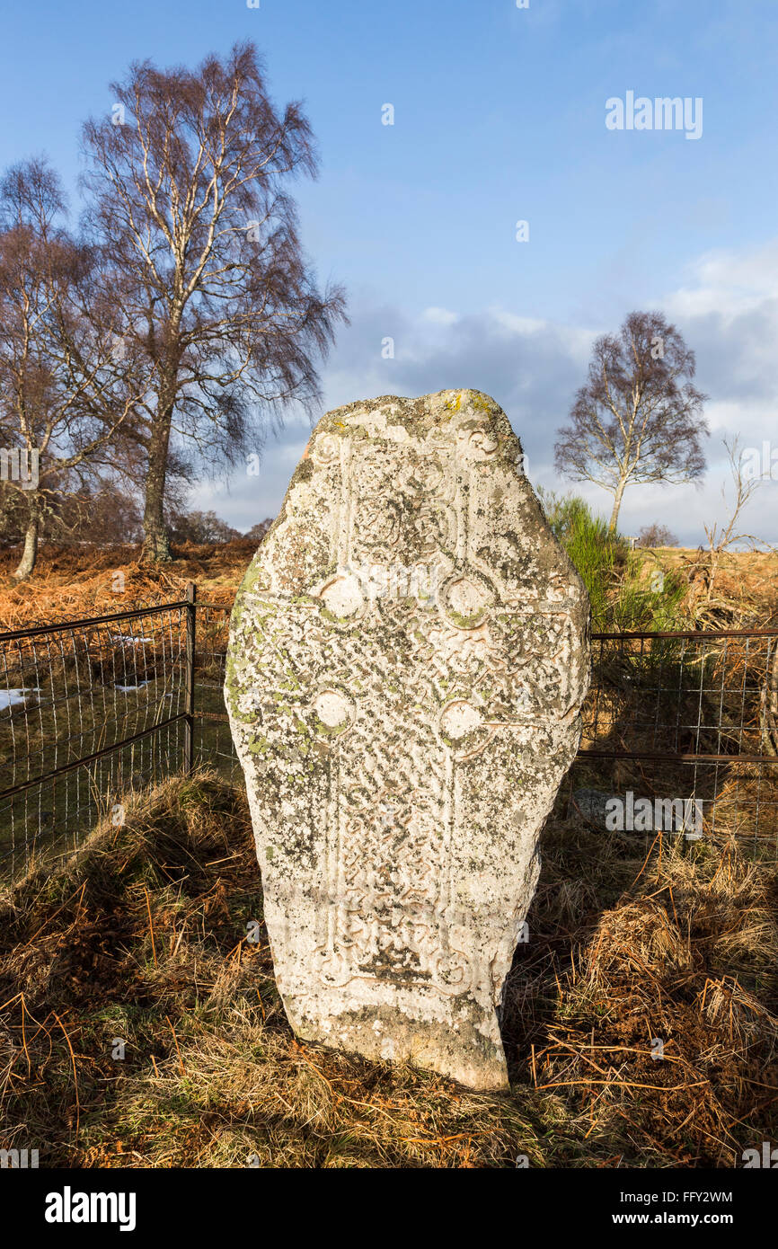 Pictish Stone with Cross at Muir of Dinnet in Scotland. Stock Photo