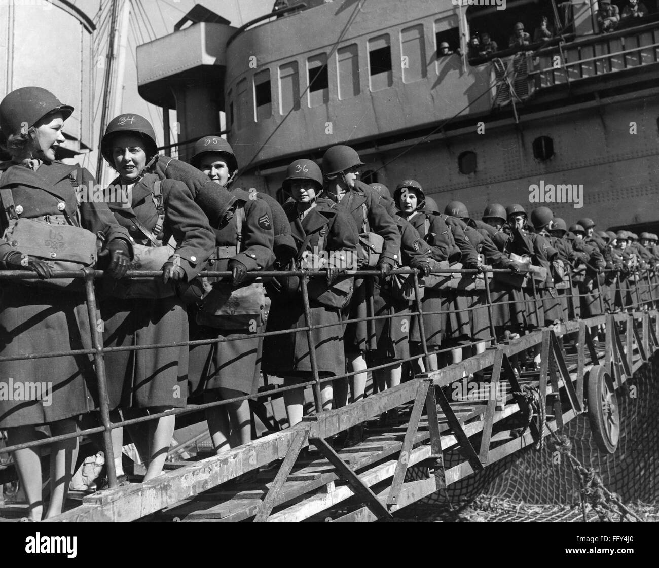 WWII: WOMEN'S ARMY CORPS. /nMembers of the Women's Army Corps disembark at a North African port during World War II. Among the first to land were Lenora Jones, Claire Justice and Martha Kerr. Photograph, 10 January 1944. Stock Photo