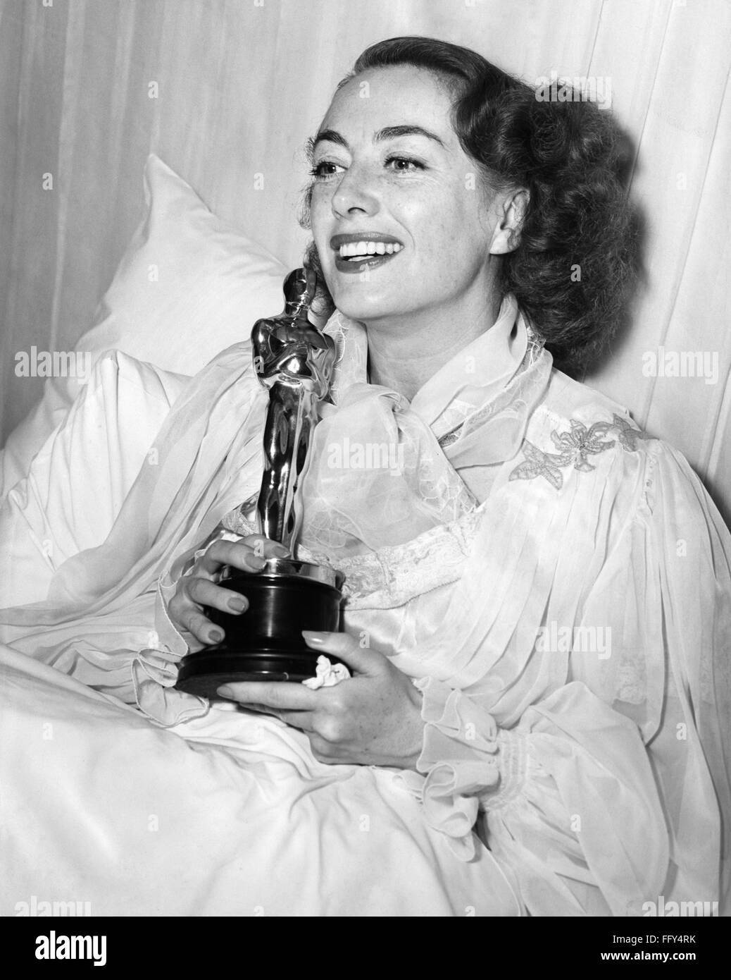 JOAN CRAWFORD (1908-1973). /nAmerican actress. Crawford accepting her ...