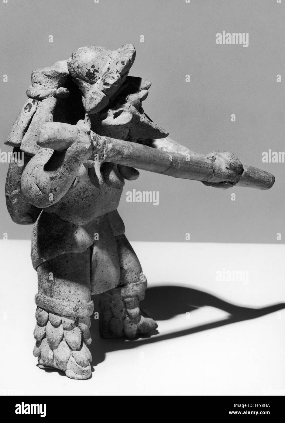 MEXICO NAYARIT FIGURE. /nCeramic figure of a man wielding a stick, by