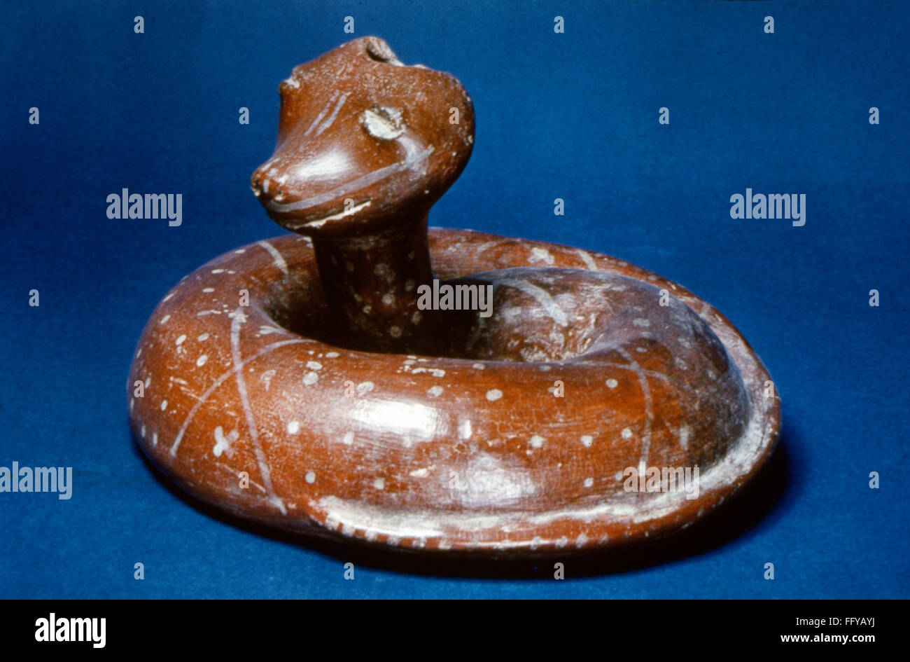MEXICO NAYARIT SNAKE. /nPainted redware figure of a coiled snake. By