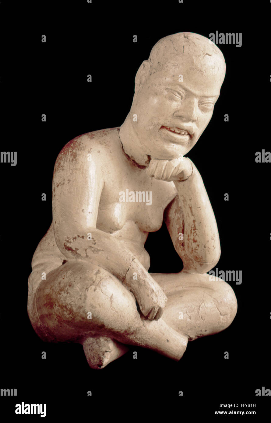 MEXICO: SEATED FIGURE. /nPolished slipped pottery sculpture of a seated figure. From Las Bocas, Puebla, Mexico, 1150-550 B.C. Stock Photo