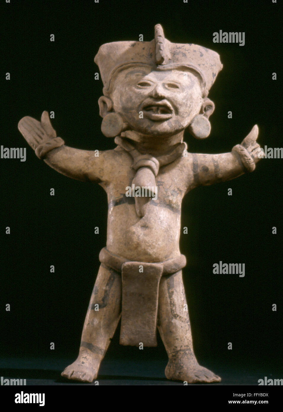 MEXICO: TOTONAC FIGURE. /nCeramic smiling man figure of the Totonac culture, Veracruz, Mexico, c600-900 A.D. Stock Photo