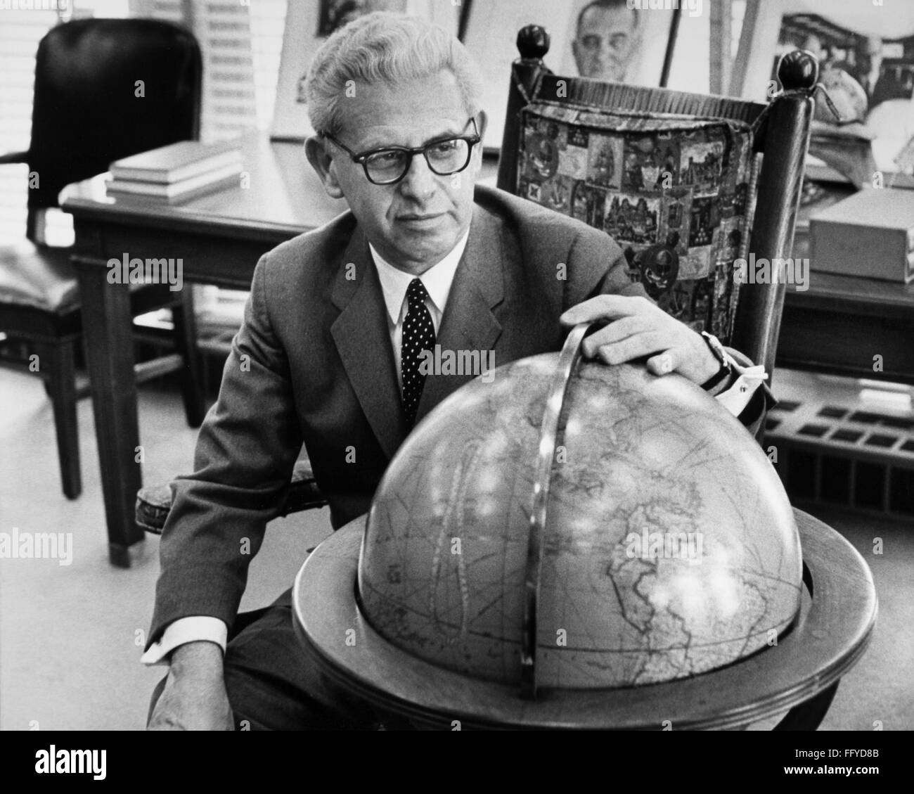ARTHUR GOLDBERG (1908-1990). /nAmerican statesman and jurist. As U.S. Ambassador to the United Nations, photographed with a globe in his office at the U.S. Mission in New York City, 22 February 1967. Stock Photo