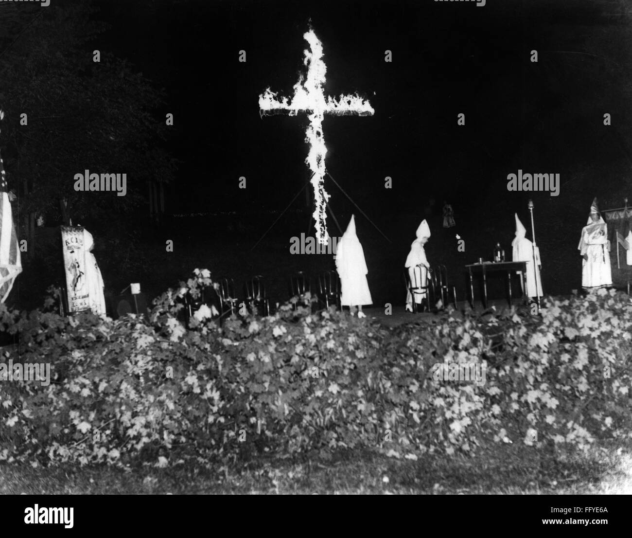 KU KLUX KLAN RALLY, 1940. /nCross burning at a rally in support of 'Americanism,' conducted jointly by the Ku Klux Klan and the German-American Bund, at the Bund's Camp Nordland in Andover, New Jersey, 18 August 1940. Stock Photo
