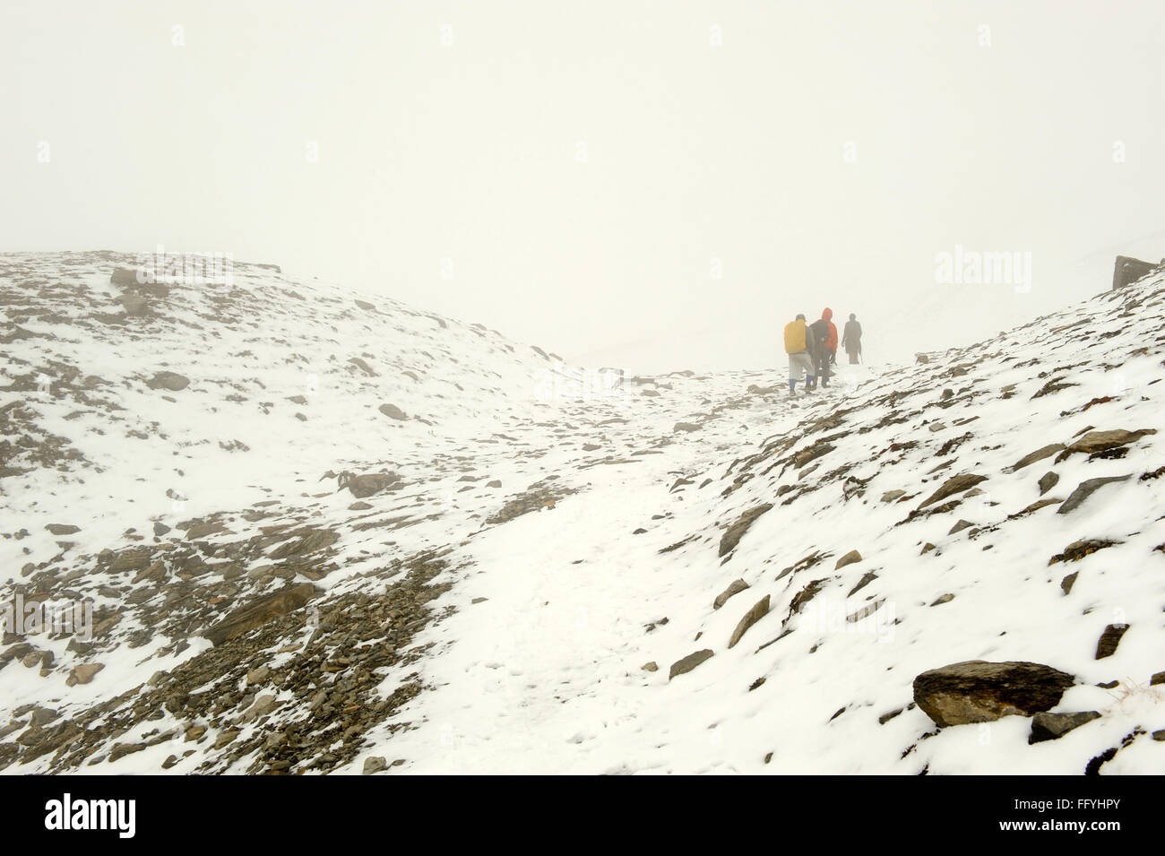 Trekker on snow way to Thilicho ; Nepal Stock Photo