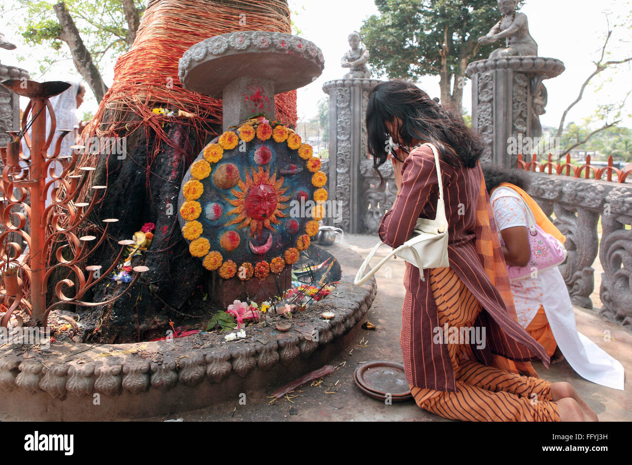 Women praying sun god mahabhairav shiva temple tezpur Assam India Stock Photo
