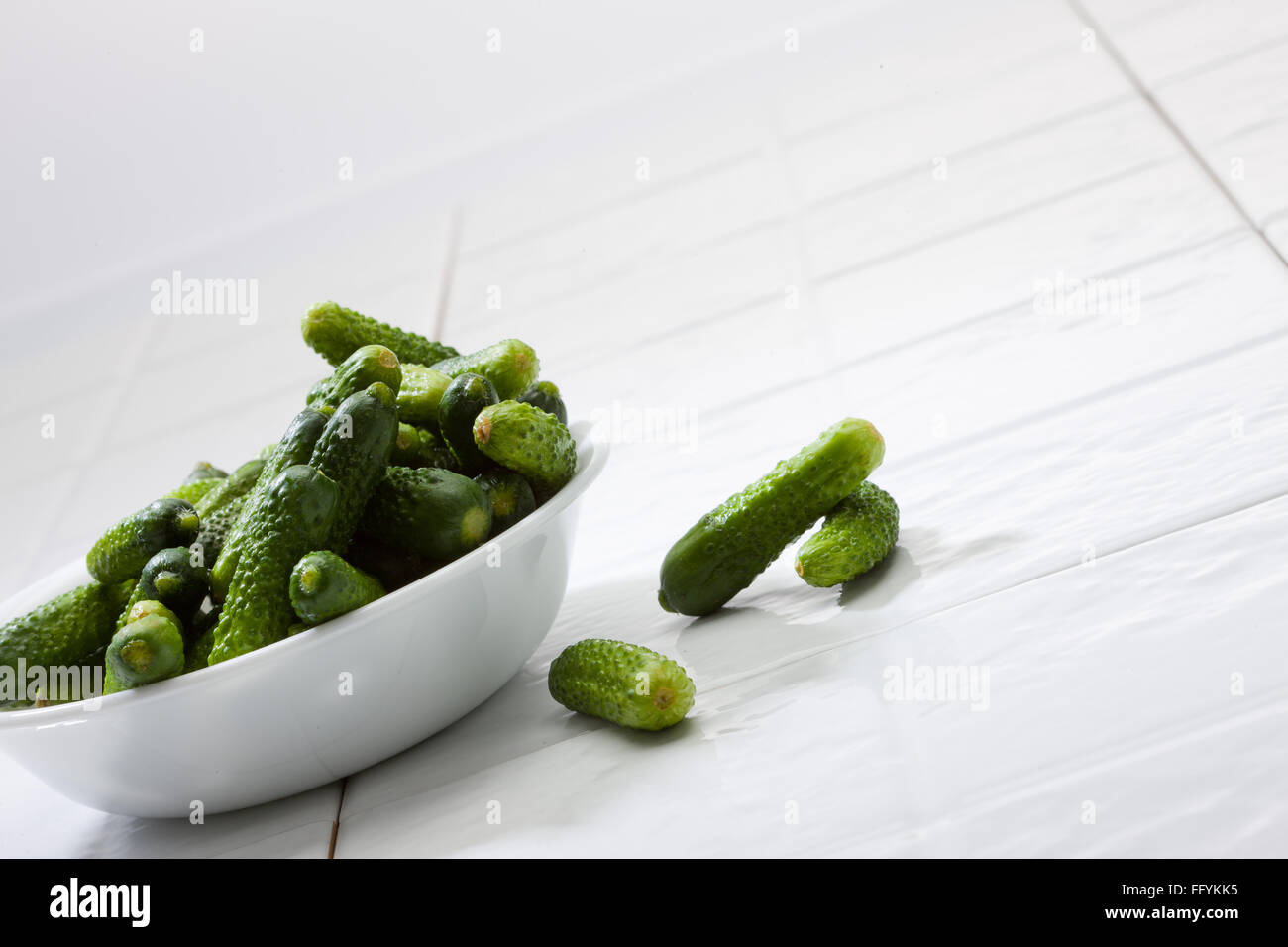cucumbers in bowl Stock Photo