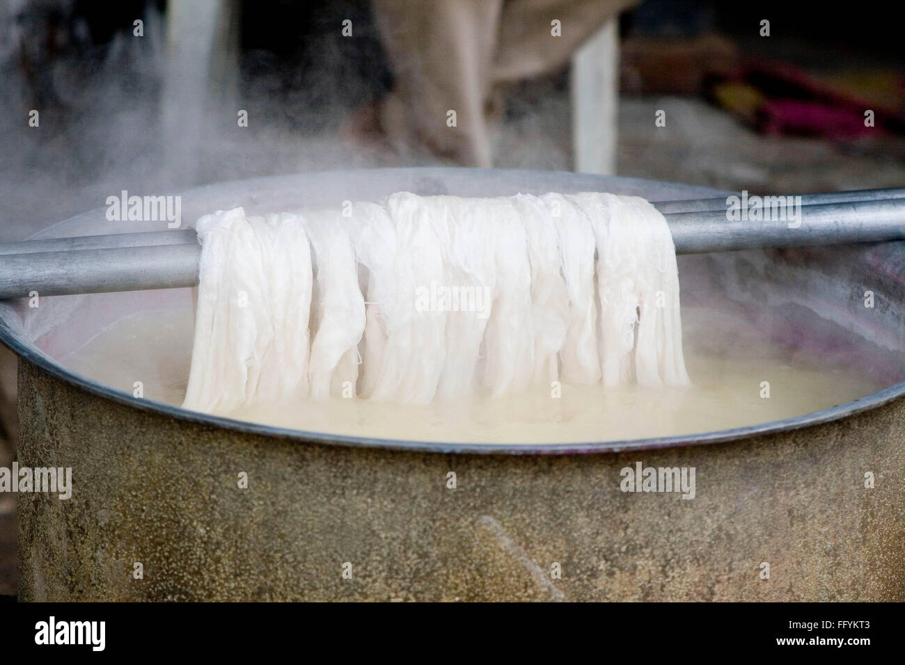 Cleaning silk in warm water in tub Stock Photo Alamy