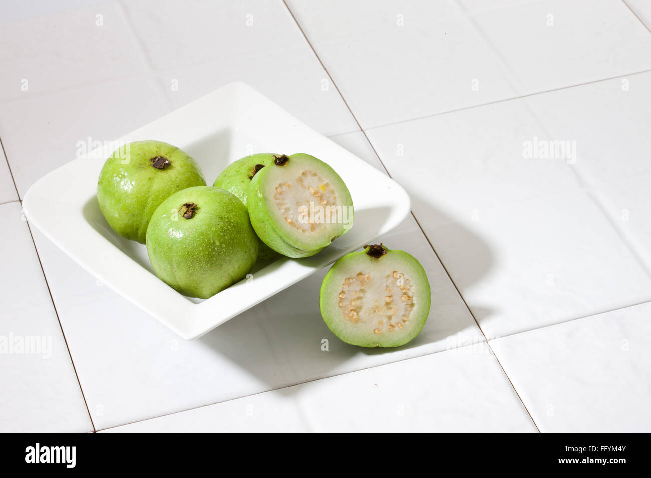 guava in bowl Stock Photo