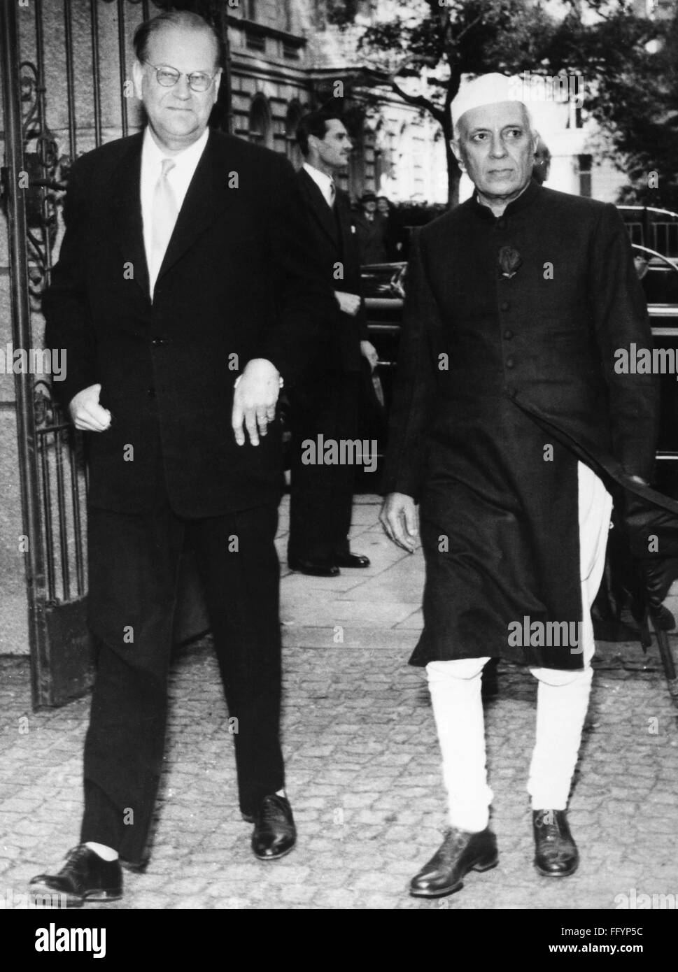 JAWAHARLAL NEHRU /n(1889-1964). Indian political leader. As Prime Minister of India, arriving at the Indian embassy in Stockholm, Sweden, with Swedish Prime Minister Tage Erlander (left), 22 June 1957. Stock Photo
