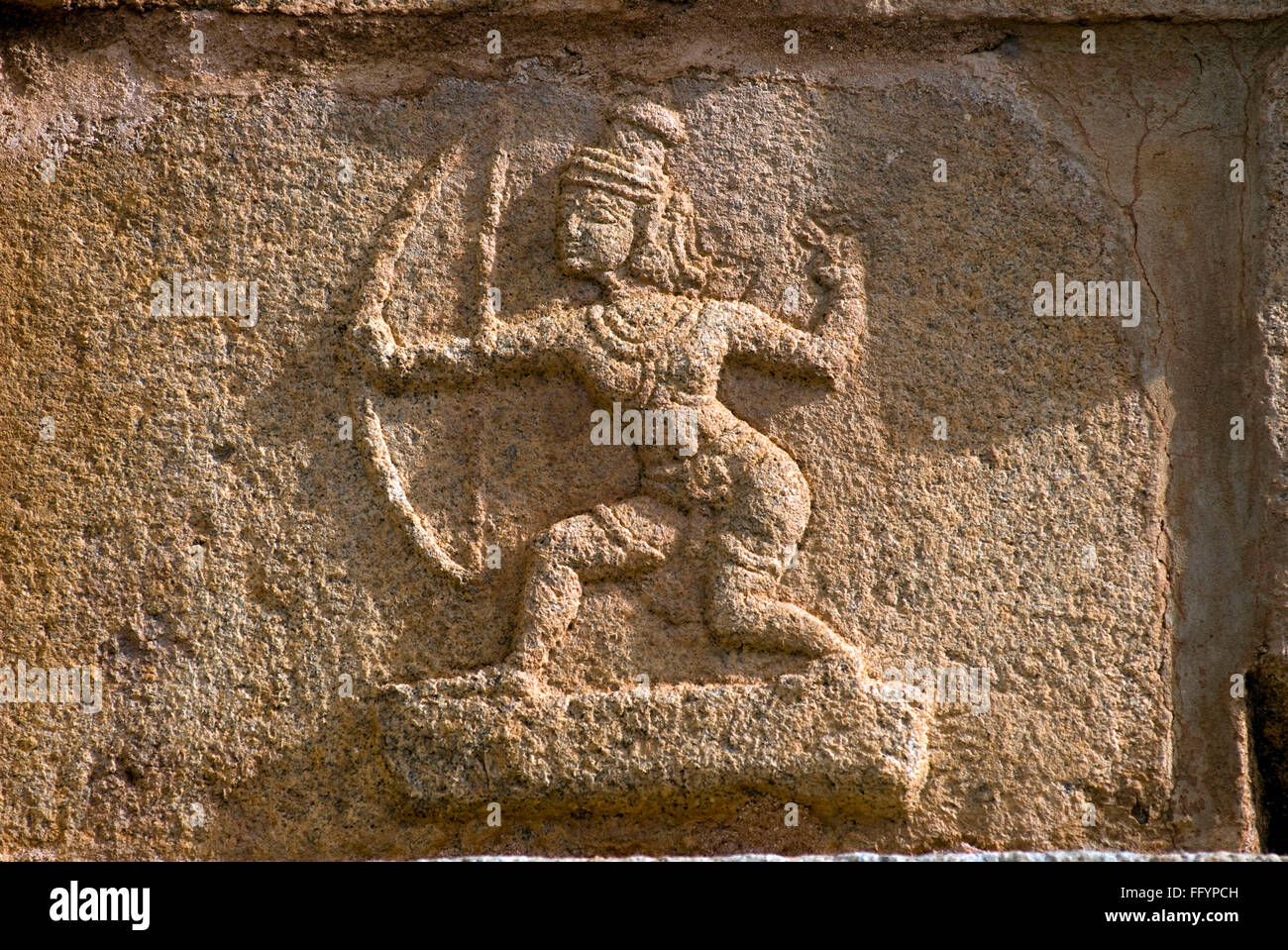 Rama with bow and arrow carved in Krishna temple in Hampi , Karnataka , India Stock Photo
