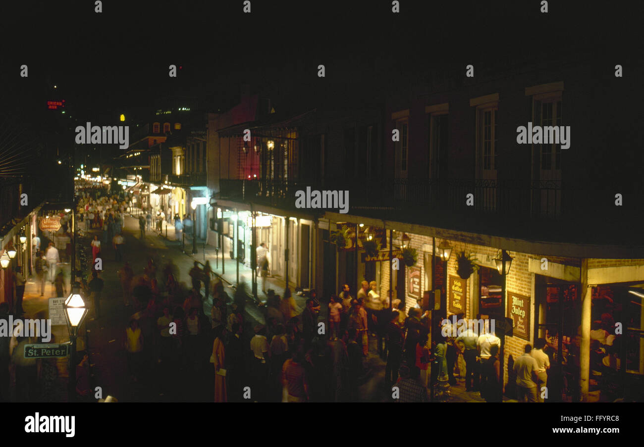 NEW ORLEANS: BOURBON STREET. /nNighttime view of Bourbon Street in the French Quarter of New Orleans, Louisiana, from the corner of St. Peter Street. Photographed c1974. Stock Photo