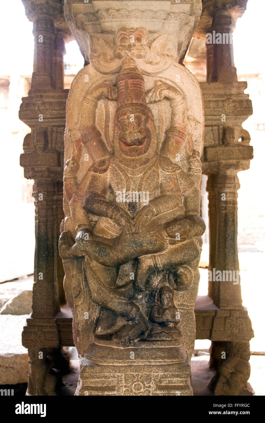 Narasimha man lion incarnation of Vishnu slaying Hiranya on his lap in Vitthala temple in Hampi , Karnataka , India Stock Photo